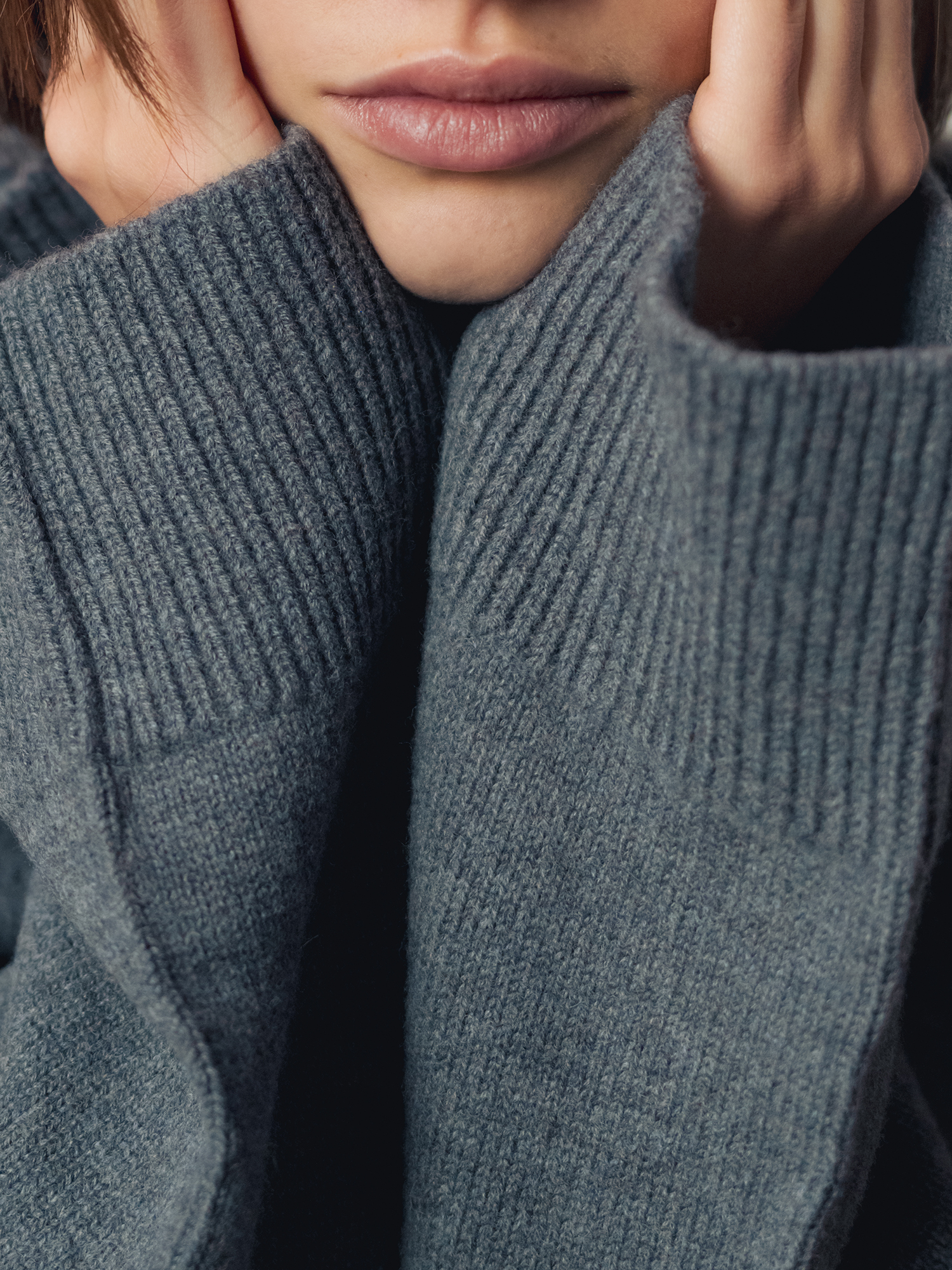 Model wearing a Francon grey sweater, photo by jeroen van de gruiter, 2025