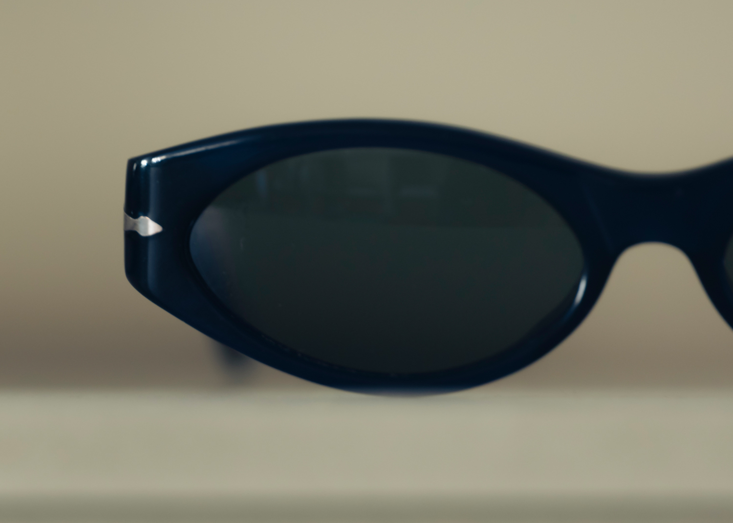Close up of Persol sunglasses, photo by jeroen van de gruiter